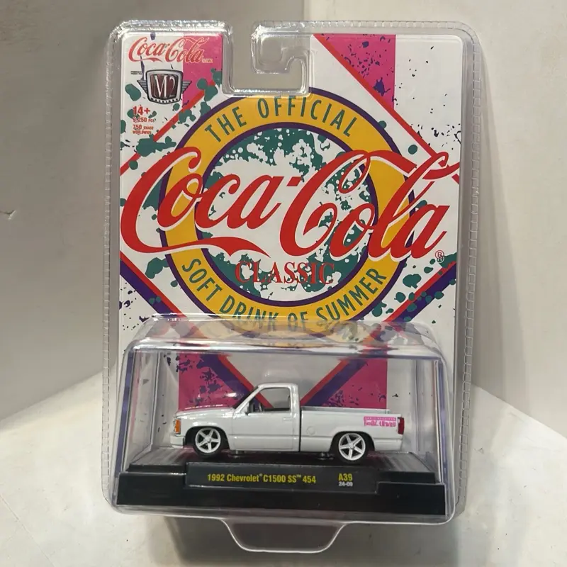 1:64 M2  Machines 1992 Chevy Ss 454 OBS 1500. White w/ pink Coke 24-09