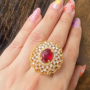 Gold plated Red adjustable Ring with multiple stones on it