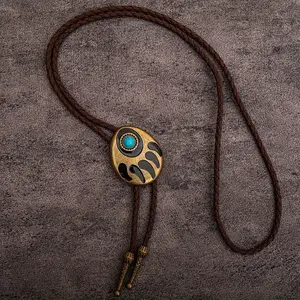 1 piece of a personalized retro bolo tie collar rope in the western cowboy style. It is a bolo leather rope necklace with natural blue turquoise and bear paw accessories, a long necklace.
