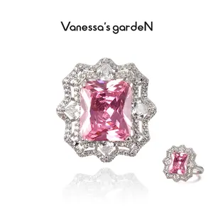 Pink Halo Collection - 18K White Gold Plated Sparkling Pink Crystal Halo Cocktail Ring Emerald Cut Solitaire Ring