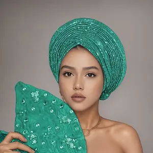 A Nigerian Wedding Hat for Women - a Durable Traditional African Muslim Headscarf with a Sequined Layered Veil, Suitable for Formal Events, Made from Breathable Fabric, Featuring a Luxurious Look, Festive Design, And High-Quality Materials