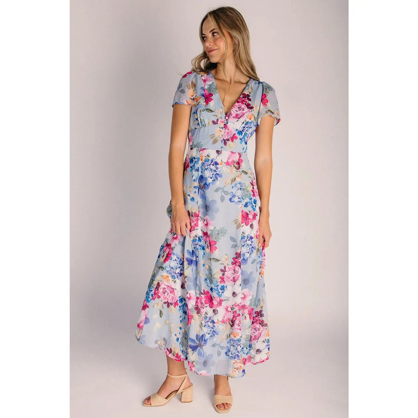The Camille V-Neck Flutter Sleeve Maxi Dress in Blue Floral