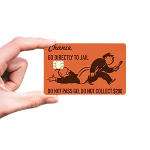 Chance Go Directly to Jail Card - Orange Design with Cartoon Character, "DO NOT PASS GO. DO NOT COLLECT $200"
