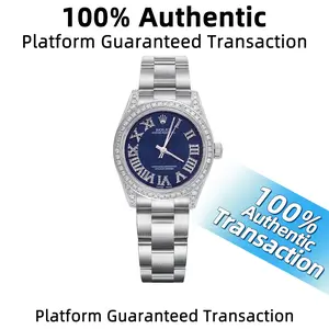 Rolex Oyster Perpetual 177200 with aftermarket dark blue dial and diamond-set bezel  Automatic movement  31MM  Dark blue dial  Stainless steel with aftermarket diamonds  Ladies’ watch  WHP038345