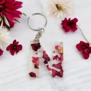 Dried roses & holographic glitter letter keychain