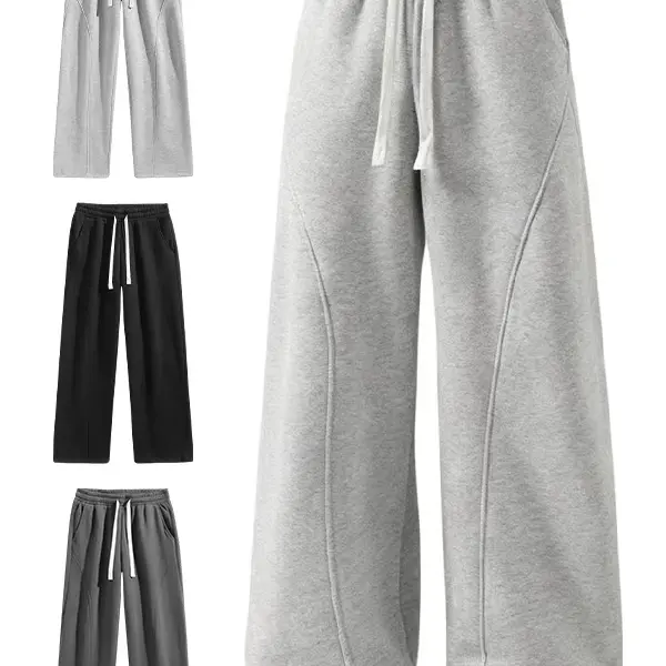 Unisex Solid-Color Drawstring Pants with Curved Blade Design—relaxed fit suitable for all seasons. Street-style men's trousers perfect for everyday wear and layering. Menswear Beige daily wear pant