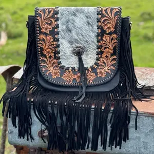 Cowhide and Fringe Bag with Intricate Embroidery and Tassel Accents for Stylish Outfits