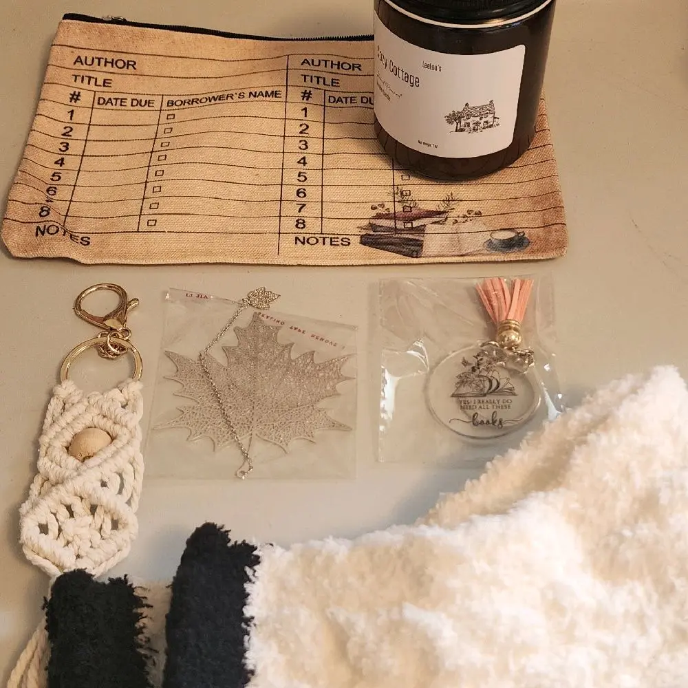 LeeLou's Treasure Book - Bookish Bundle with Macrame Keychain, Metal Leaf Bookmark, Pencil Pouch, Hand-Poured Candle & Fuzzy Socks