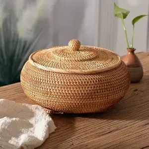 New hand-woven rattan storage box with lid, multifunctional container for storing fruits, bread, and food, organizer for kung fu tea sets and Pu'er tea bags, home kitchen woven basket