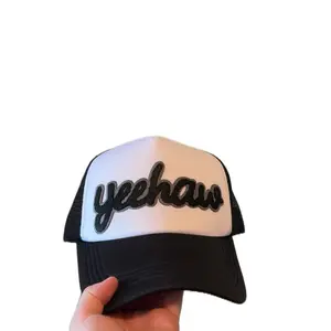 Yeehaw Trucker Hat - Black and White Design with "yeehaw" Text