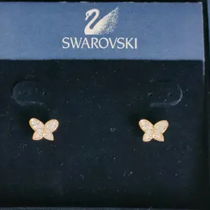 Pre-owned Swarovski Gold-plated Small Leather Goods Butterfly Stud Earrings