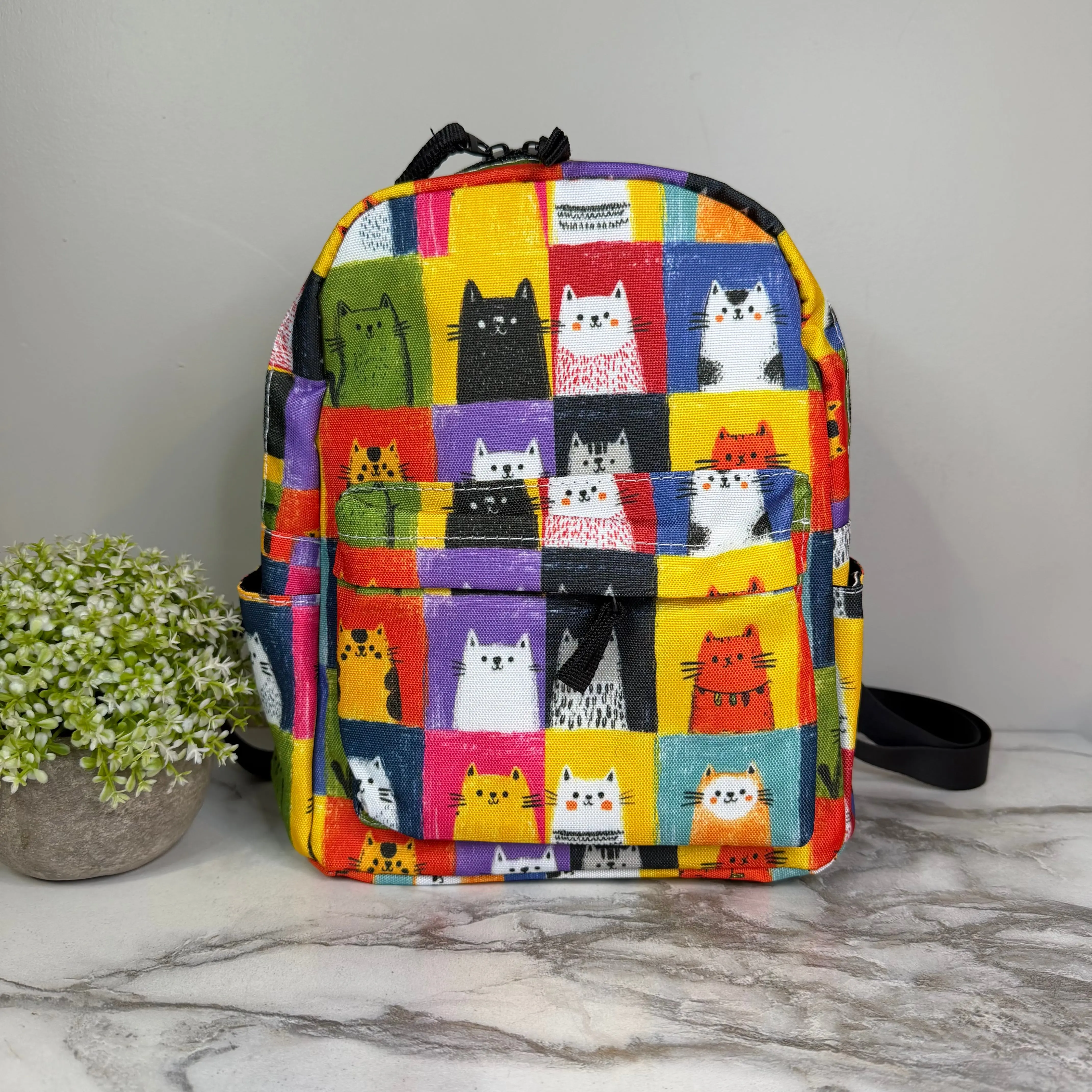 Cat Square Print Mini Backpack, 10" x 8.5" Water-Resistant Polyester Daypack for Kids & Adults with Adjustable Straps, Front & Side Pockets, 10” Tall, 18” Strap, Synthetic, 4.5” Side Panel, 8.5” Wide, Adjustable Shoulder Strap