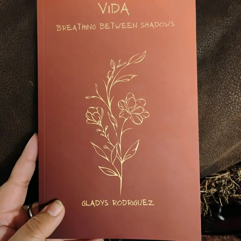 Vida: Breathing Between Shadows By Gladys Rodriguez - Red Cover with Gold Flower Design