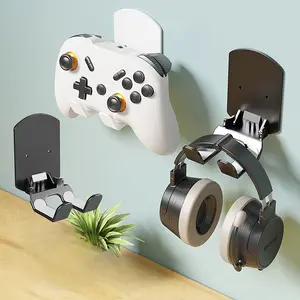 2 gamepad brackets | will not damage the wall, can hang headphones, ABS material, non-waterproof, black and white color matching.