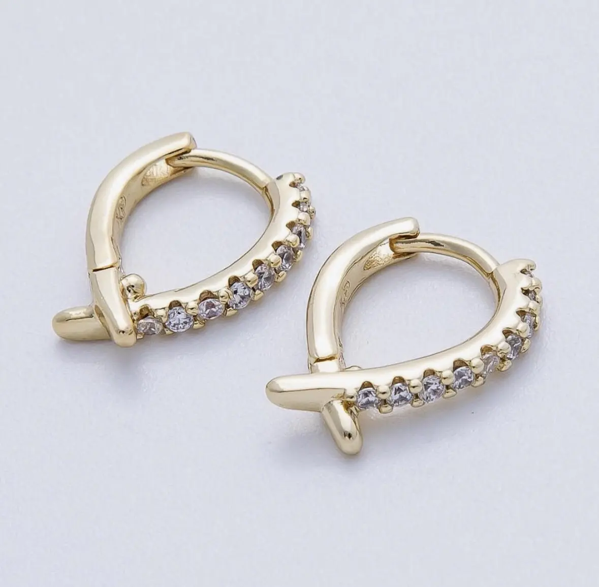 14K Gold Filled Pavé Crisscross CZ Huggie Earrings 14K Gold Filled Pavé Crisscross CZ Huggie Earrings