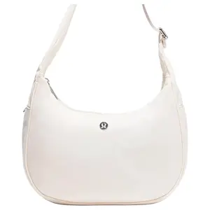 Lululemon City Essentials 4L Logo Mini Crossbody Bag in Ivory for Women