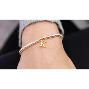 Combo beads on beads two tone initial bracelet