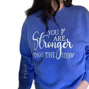 G180 Gildan Sweatshirt 18000 Heavy Blend Crewneck     You are stronger than the storm this to shall pass  written on sleeve