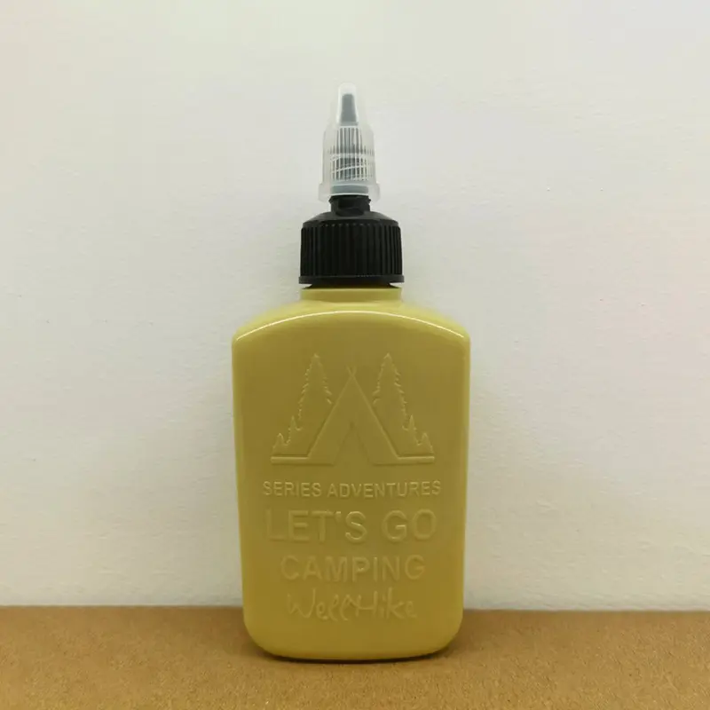 W khaki oil bottle
