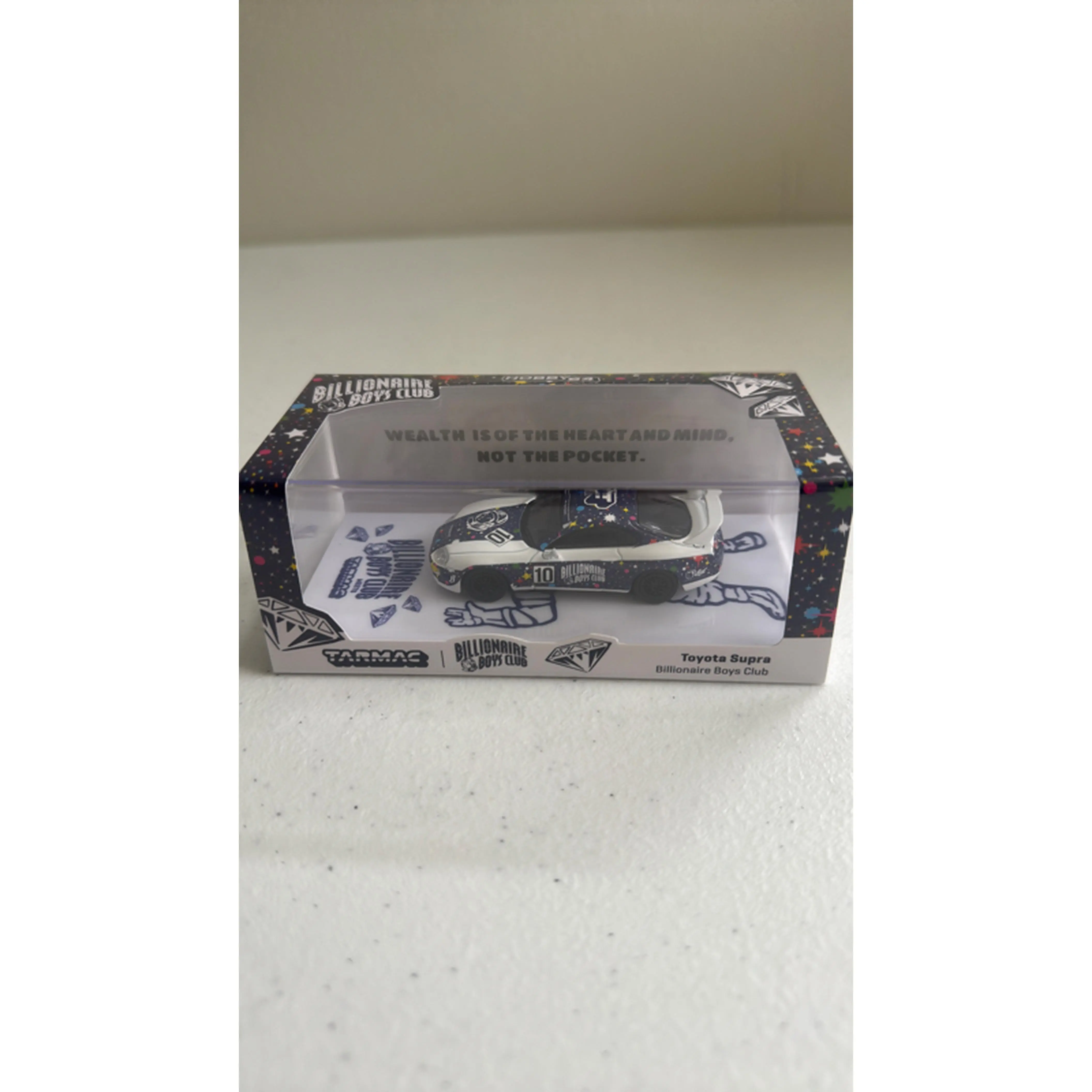 This is a Tarmac Works 1/64 scale Toyota Supra 'Billionaire Boys Club' Special Edition.