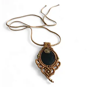 Black Onyx Macramé Pendant: Power Wrapped in Style