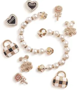 10PCS Bling Shoe Charms for women with gold, rhinestones & pearl details. Includes bear, mini bag, heart & flower. Perfect for clogs, parties & gifts