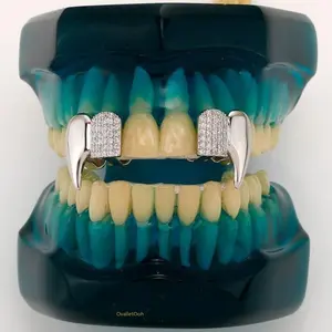 A Complete Set of Golden Teeth Adorned with Zirconia, Designed for Men Who Embrace a Vampire Aesthetic. This Fashionable Teeth Set Makes for Perfect Gifts for Occasions Like Valentine'S Day, Halloween, Christmas, Or Birthdays