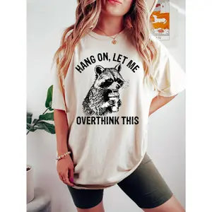 Women's Funny Raccoon Print T-Shirt with "Hang On, Let Me Overthink This" Slogan - Casual Relaxed Fit Short Sleeve Round Neck Tee, Cute Raccoon & Overthinking Design for Casual Attire, All-Season (Beige/ Brown)