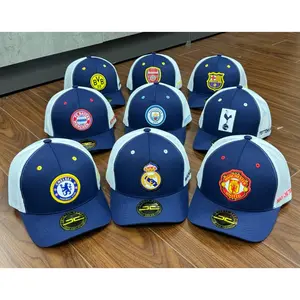 Fashionable baseball caps printed with the logos of famous football clubs.