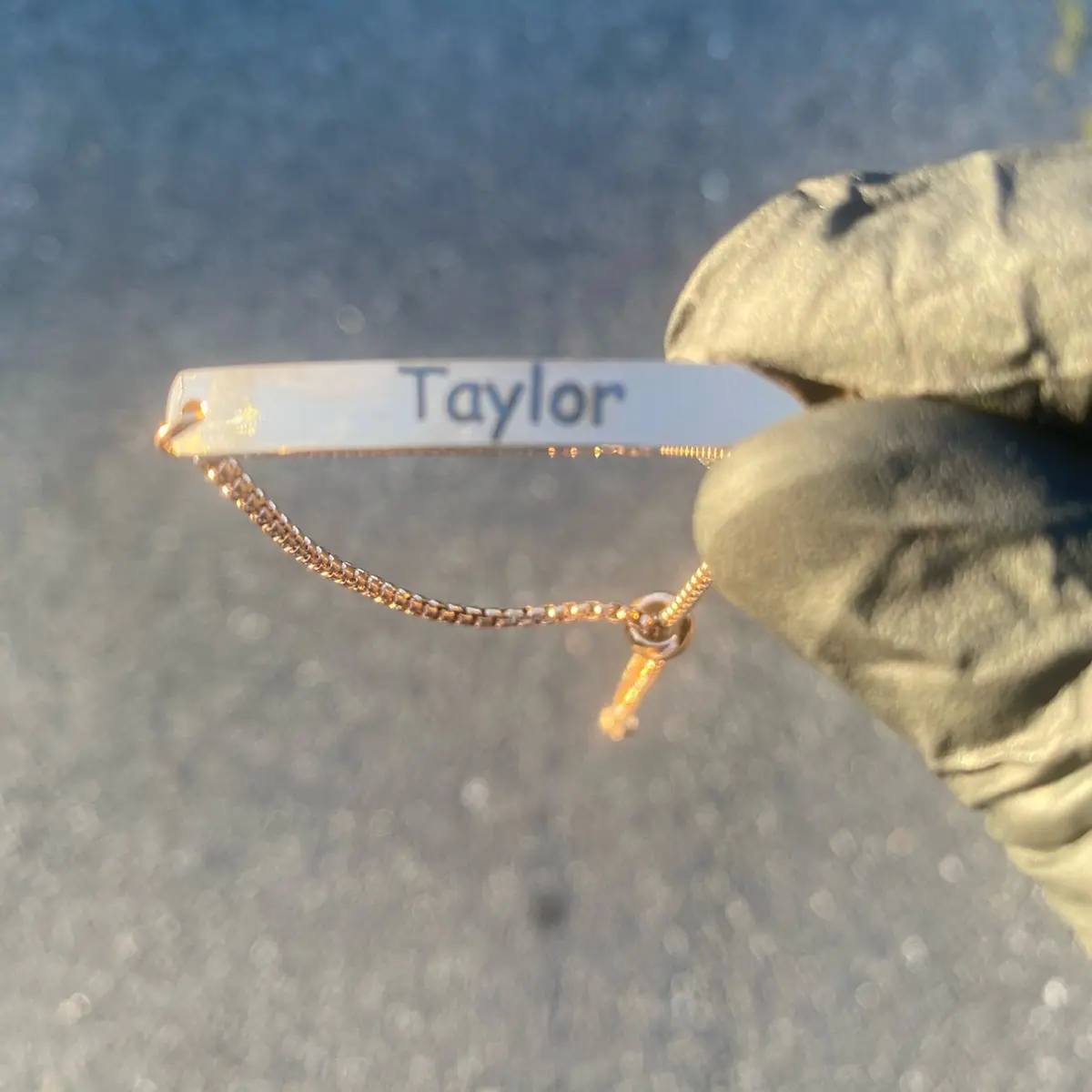 name bracelet featuring “Taylor “