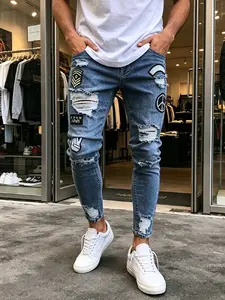 SRETOUU Men's Vintage Light Wash Distressed Patchwork Slim Jeans with Custom Patches & Stretch Fabric for Streetwear Comfort - Menswear