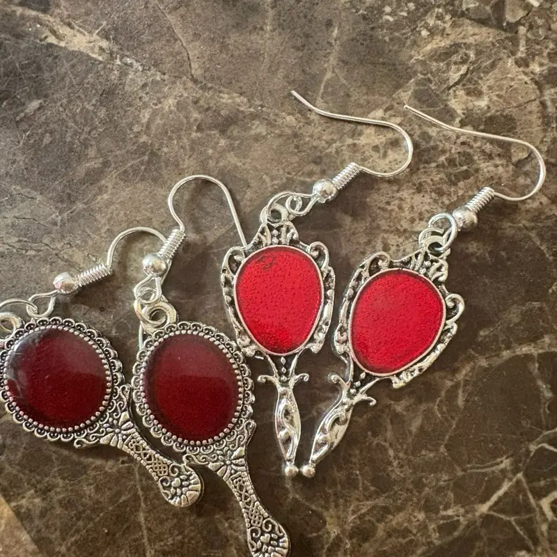 Mirror Mirror On The Wall Who Looks The Greatest Of All With Mirror Earrings Red Oval Design Silver Frame