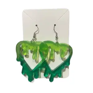 Green drippy heart earrings