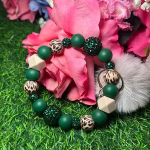 Sassy emerald wristlet keychain color scheme emerald green, off nude and bling beads made with wire trending wristlet