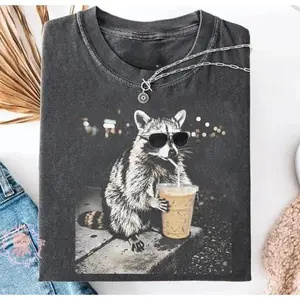 Raccoon Drinking Iced Coffee Funny Graphic Tee, 100% Cotton Oversized Comfort Outfit, Coffee Lover Meme Cute Fashion Shirt, Perfect Valentine's Day Gift For Him Her Family Friends