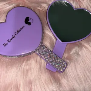 Heart shaped handheld mirror
