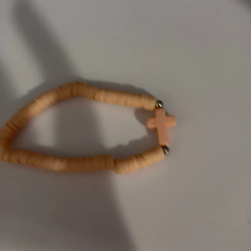 Tan cross bracelet