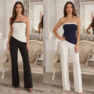 ASYMMETRICAL STRAPLESS JUMPSUIT - UNEVEN PATTERN LENGTH - CLASSY AND ELEGANT DETAILS - ZIPPER ON THE BACK