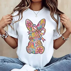 Women Casual Round Neck Short Sleeve T Shirt Featuring Easter Bunny with Pink Bow and Colorful Swirls Perfect for Spring Festival and Holiday Weekend Casual Wear