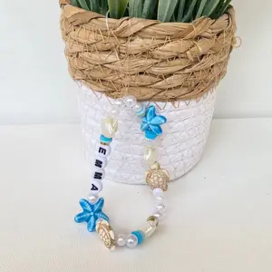 Custom personalized under the sea phone charm | beaded phone charm | pearl beads | personalized | heishi beads | clay beads | seashell charm