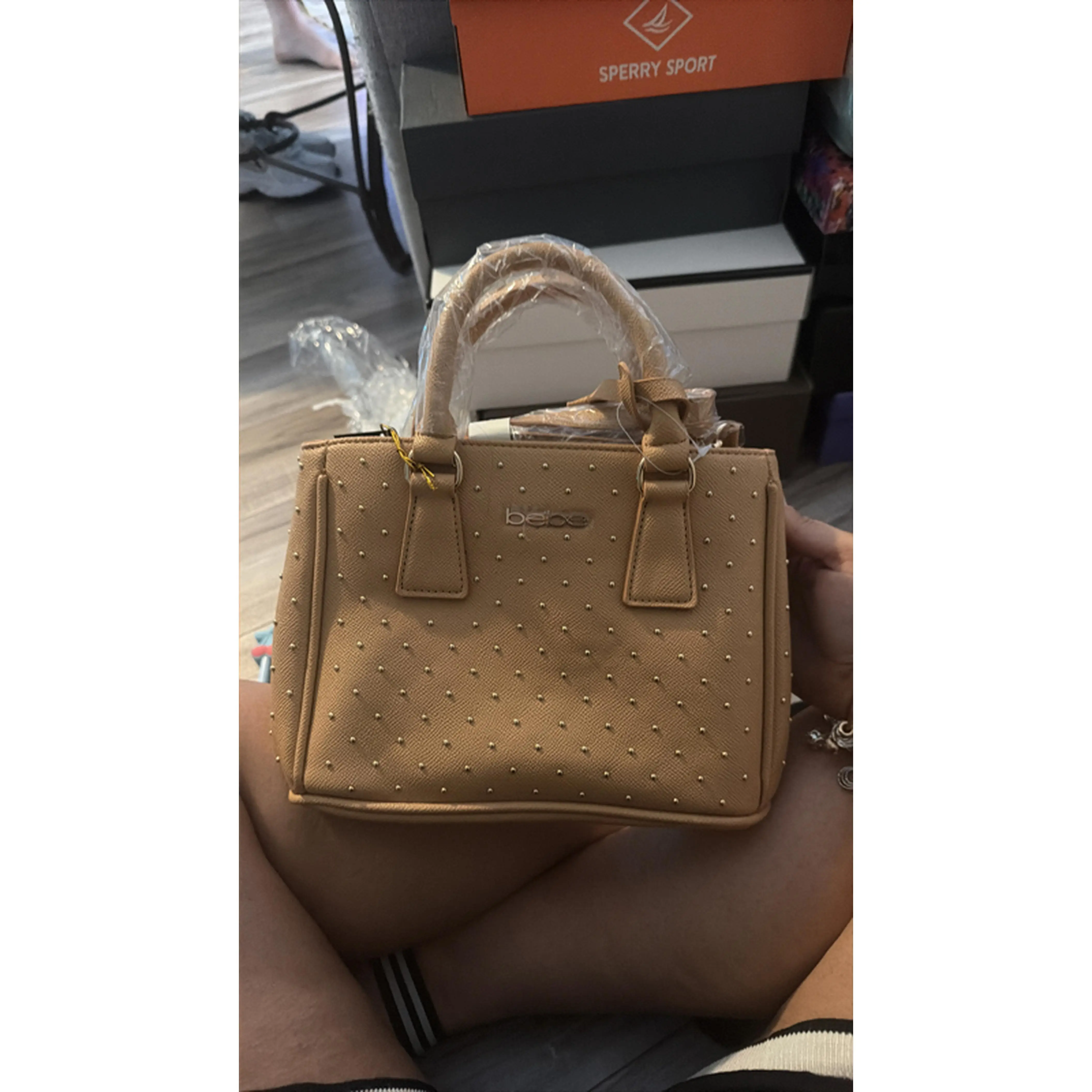 Tan Handbag with Studded Detailing and Dual Handles for Everyday Use