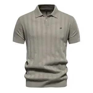 Men's short-sleeved polo knitwear with stripes, with a button-down collar and a small logo with letters on the chest, a version of a casual short-sleeved polo shirt for men, suitable for autumn and winter.