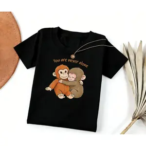 Viral Monkey Shirt, Cute Baby Monkey Hugging Toy Graphic Tee, Emotional Animal Lover Gift, Soft Vintage Washed Unisex T-Shirt, Cozy Aesthetic Monkey Meme Shirt
