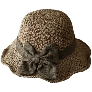 2026 Versatile retro woven handmade straw hat with ruffled bow, elegant French sun hat, foldable, breathable travel beach hat.