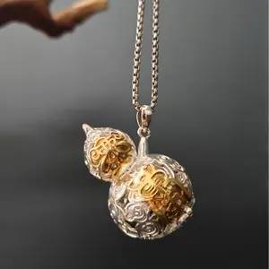 Chinese Hollow-carved Two-toned Gourd Symbolizing health and longevity, thriving descendants, protection from evil spirits, family harmony and reunion, broad-minded tolerance, and wisdom and learning.