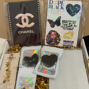Cozy box_includes 2 inserts, phone grip, charm, dust plug, and clear case