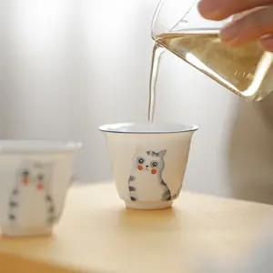 AA2. Cute hand-painted cat and peach tea cup | Underglaze ceramic kung fu tea cup