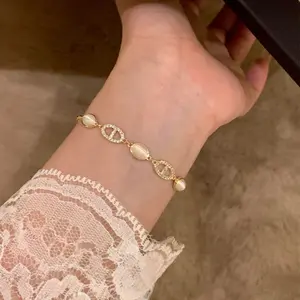 Minimalist Oval Cat Eye Bracelet – Dainty Gold Chain with Crystal Pig Nose Charms for Women