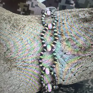 Sterling Pearls and Pink Conch Bracelet - Elegant Design Featuring Unique Beads