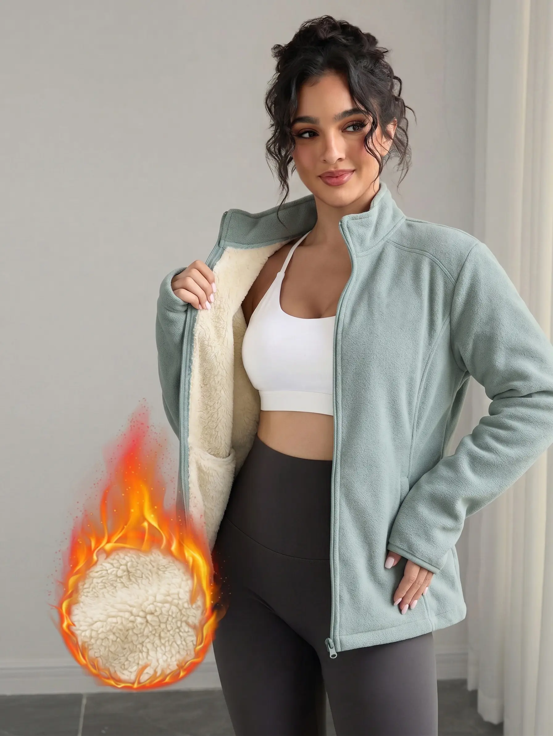 Women’s fleece-lined short zip-up jacket with a stand collar and fluffy interior—casual, warm outerwear for autumn and winter.